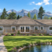 1390 Sq Ft Log Cabin House Plan with 2 Bedrooms, 2 Bathrooms, and a Wraparound Porch