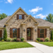 1715 Sq Ft European House Plan with 3 Bedrooms, 2 Bathrooms, and a Side-Entry 2-Car Garage